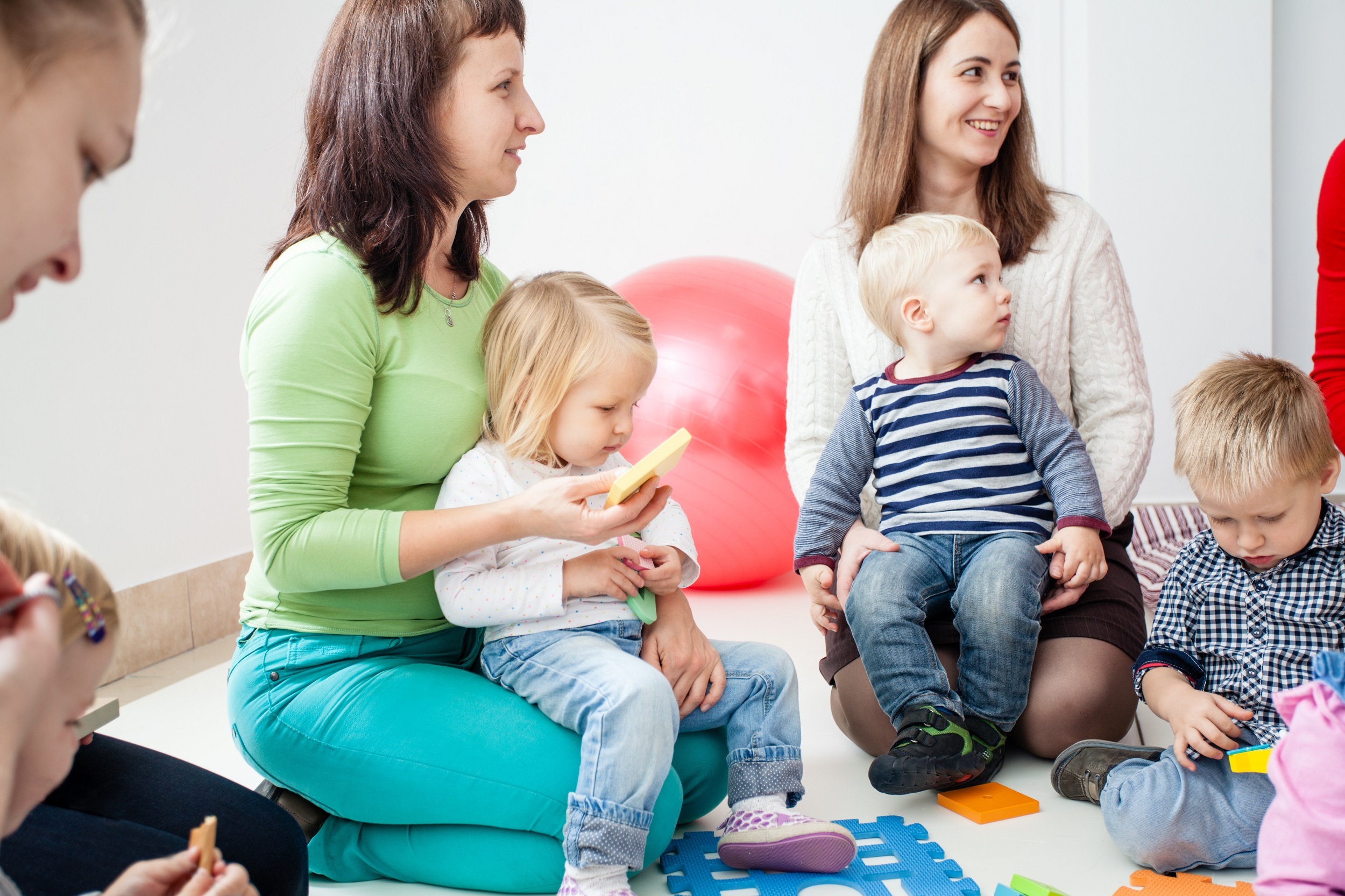 Young moms with their kids