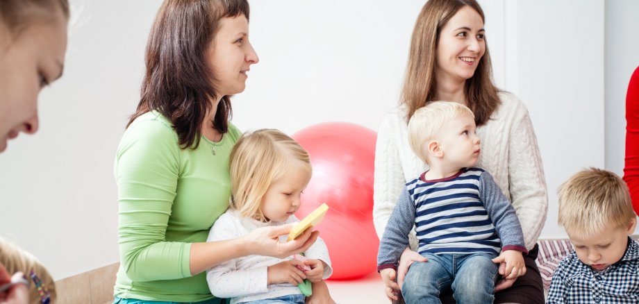 Young moms with their kids Young moms with their kids