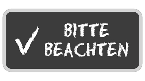 Kreidetafel mit dem Schriftzug: Bitte beachten