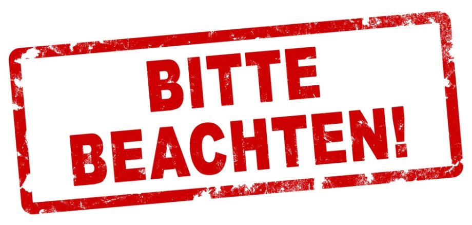 roter Stempel auf weißem Grund mi der Aufschrift Bitte beachten