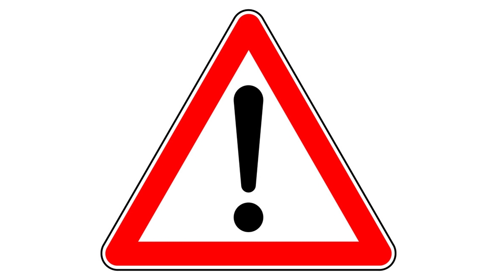 Symbolbild Achtung Warndreieck mit einem Ausrufezeichen vor weißem Hintergrund